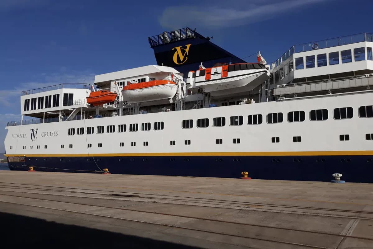 Passenger vessel alongside a marine repair facility